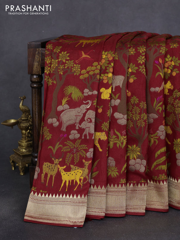 Dola silk saree maroon with allover shikarga weaves and zari woven border
