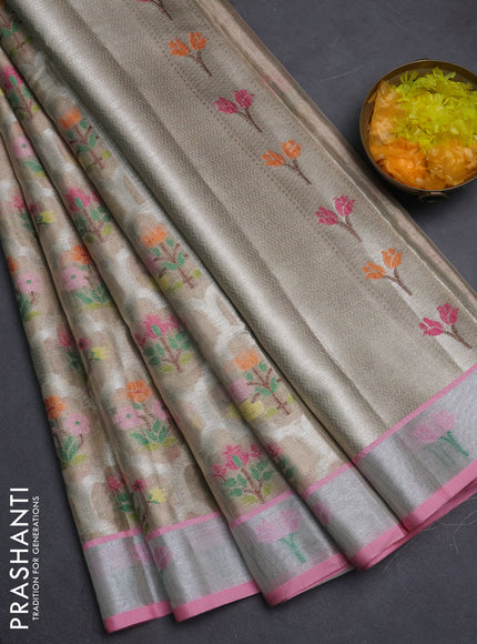 Cotton tissue zari kota saree beige and pastel pink with allover floral zari woven buttas and floral thread woven border