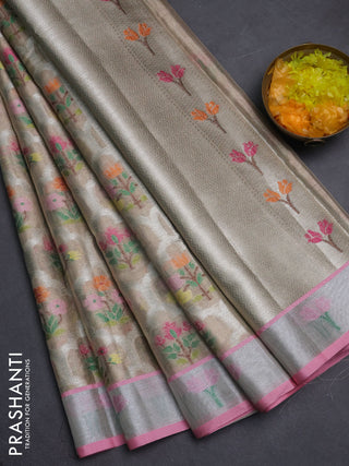 Cotton tissue zari kota saree beige and pastel pink with allover floral zari woven buttas and floral thread woven border