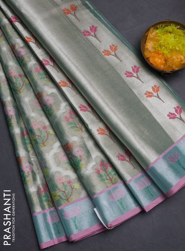 Cotton tissue zari kota saree green shade and pink with allover floral zari woven buttas and floral thread woven border
