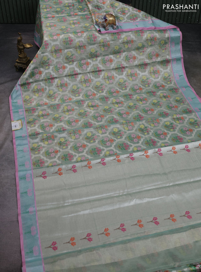 Cotton tissue zari kota saree green shade and pink with allover floral zari woven buttas and floral thread woven border