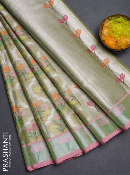 Cotton tissue zari kota saree light green and pink with allover floral zari woven buttas and floral thread woven border