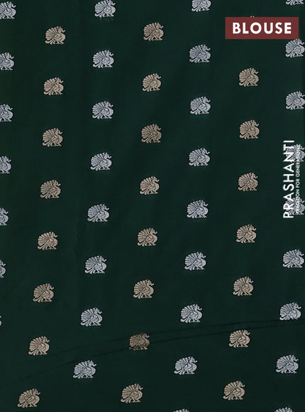 Cotton zari kota saree pista green with allover zari woven buttas and horse zari woven butta border