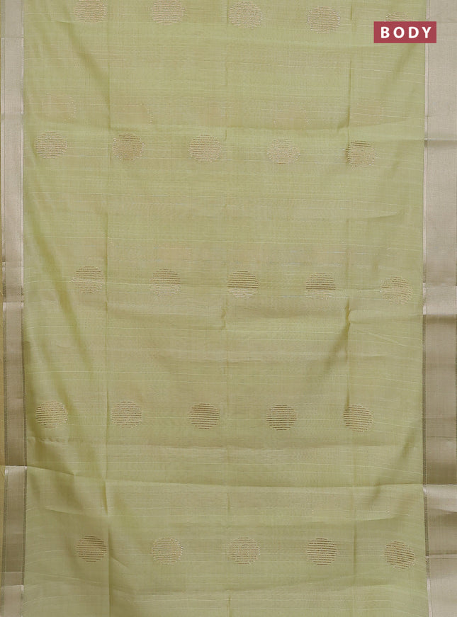 Semi dupion saree pista green with zari woven buttas and madhubani printed pallu & blouse