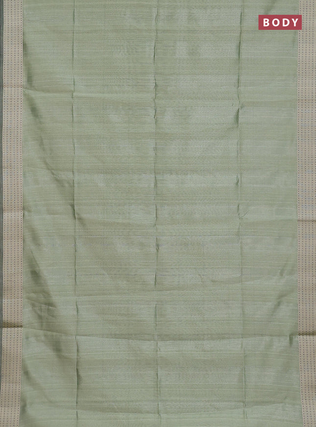 Semi dupion saree light green with plain body and madhubani printed pallu & kantha stitch work