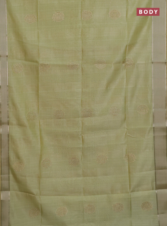 Semi dupion saree pista green with zari woven buttas and madhubani printed pallu & blouse
