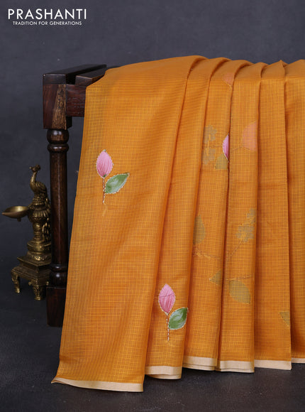 Kota saree mustard yellow with hand prints & kantha stitch work and zari woven piping border