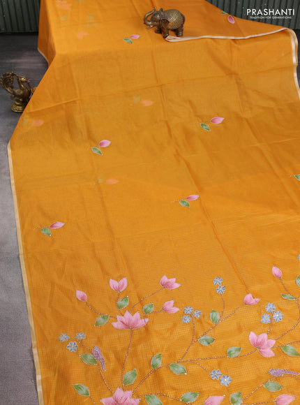 Kota saree mustard yellow with hand prints & kantha stitch work and zari woven piping border