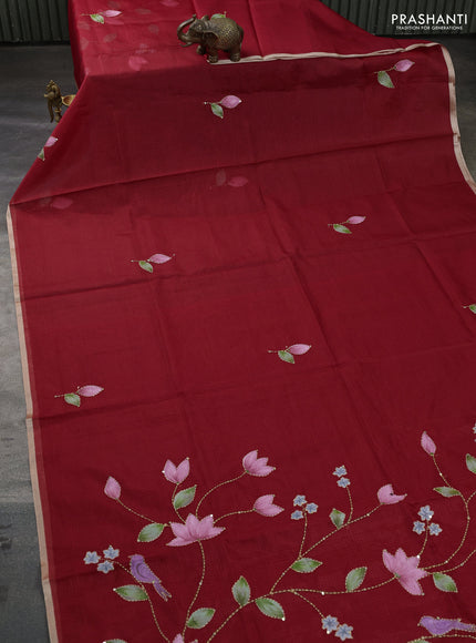 Kota saree red with hand prints & kantha stitch work and zari woven piping border