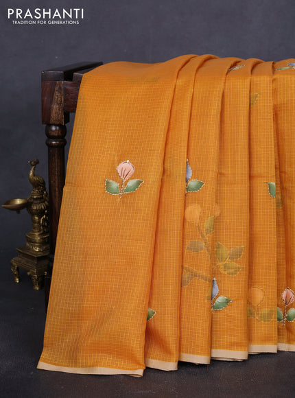 Kota saree dark mustard with hand prints & kantha stitch work and zari woven piping border