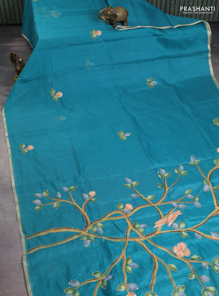 Kota saree teal green with hand prints & kantha stitch work and zari woven piping border