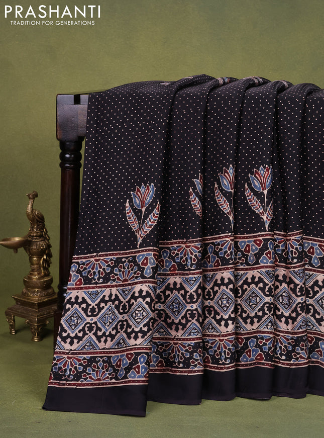 Modal silk saree black with allover ajrakh prints and printed pallu