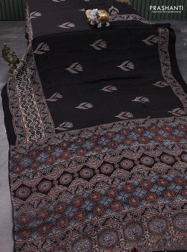 Modal silk saree black with allover ajrakh prints and printed pallu