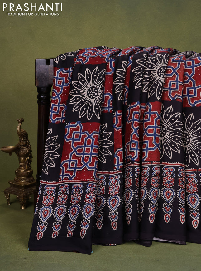 Modal silk saree black with allover ajrakh prints and printed pallu