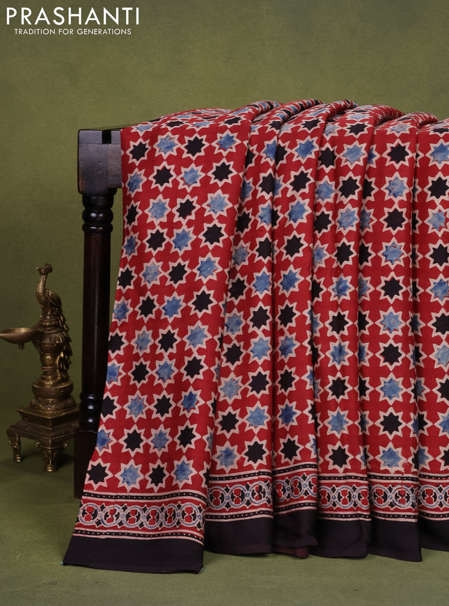 Modal silk saree red and black with allover ajrakh prints and printed pallu