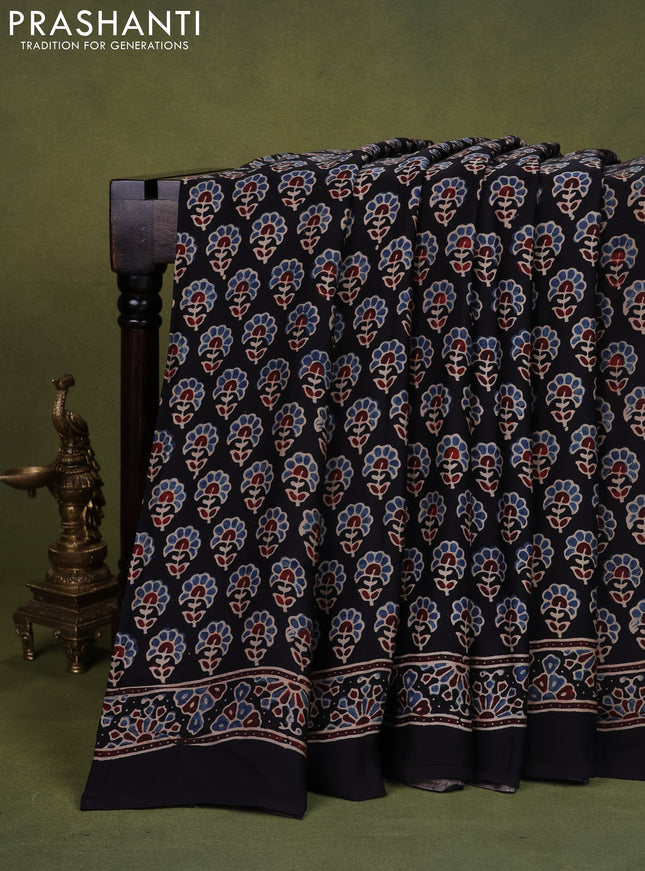 Modal silk saree black with allover ajrakh prints and printed pallu