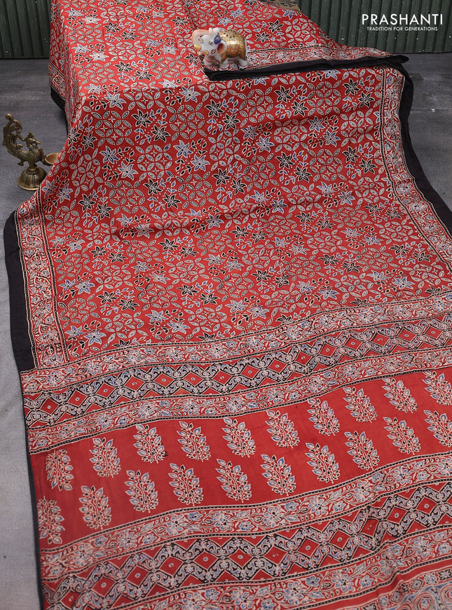 Modal silk saree red and black with allover ajrakh prints and printed pallu