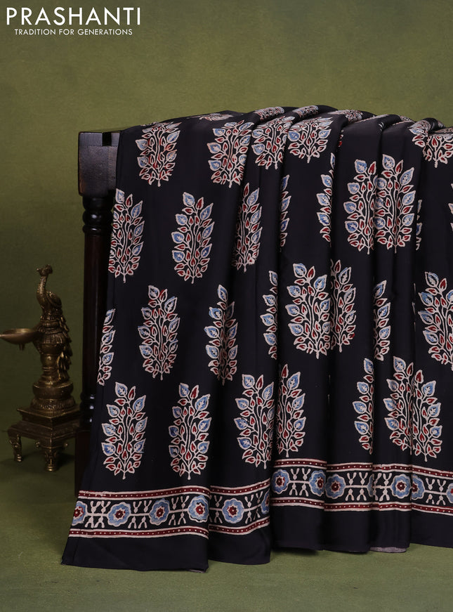 Modal silk saree black with allover ajrakh prints and printed pallu