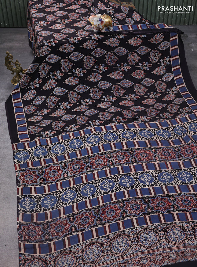Modal silk saree black with allover ajrakh prints and printed pallu