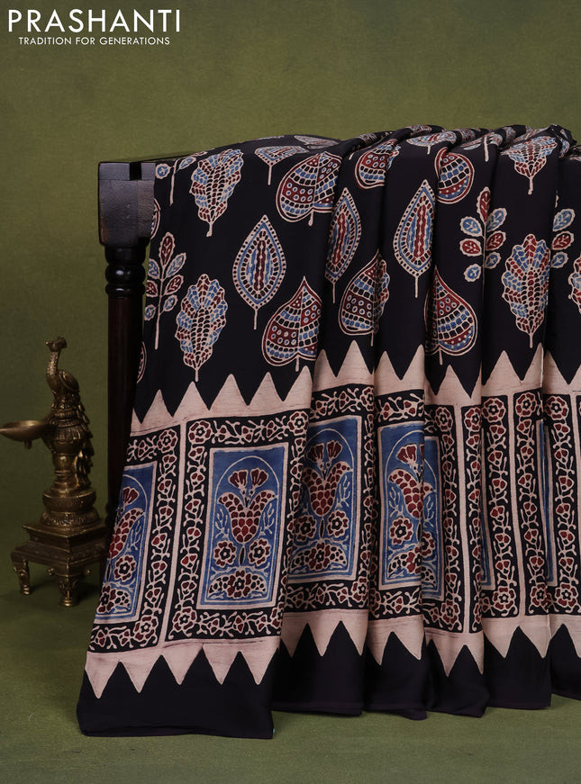 Modal silk saree black with allover ajrakh prints and printed pallu