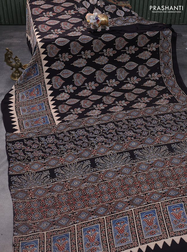 Modal silk saree black with allover ajrakh prints and printed pallu