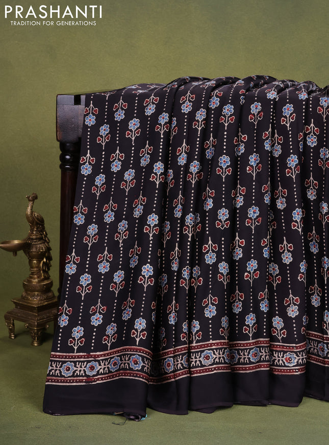 Modal silk saree black with allover ajrakh prints and printed pallu