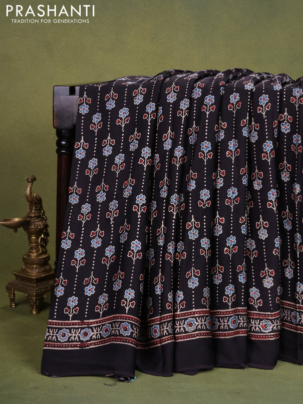 Modal silk saree black with allover ajrakh prints and printed pallu