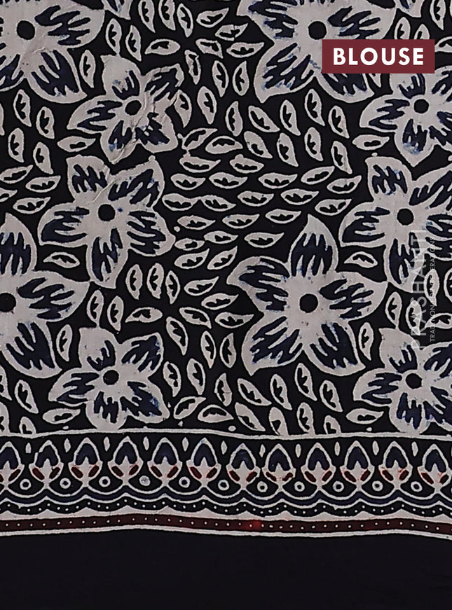 Modal silk saree black with allover ajrakh prints and printed pallu