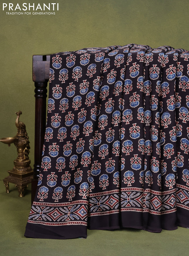 Modal silk saree black with allover ajrakh prints and printed pallu