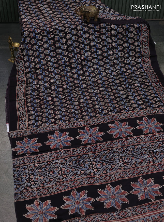 Modal silk saree black with allover ajrakh prints and printed pallu