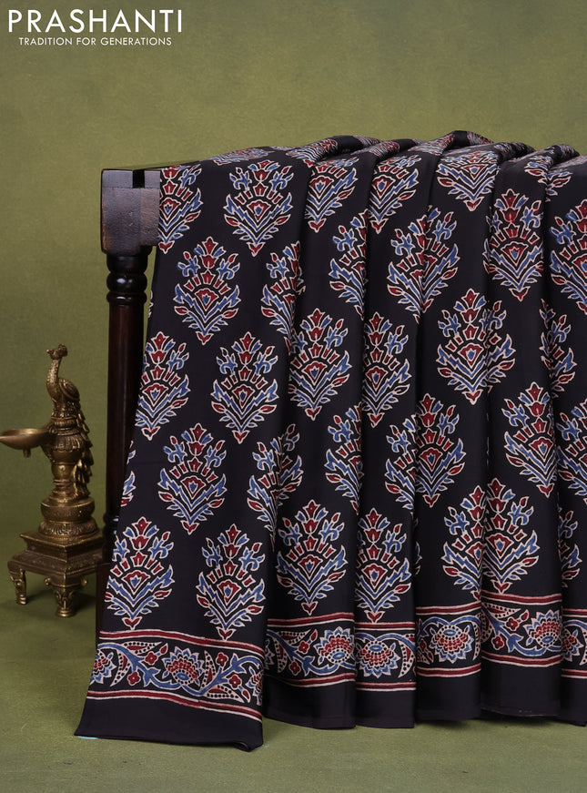 Modal silk saree black with allover ajrakh prints and printed pallu
