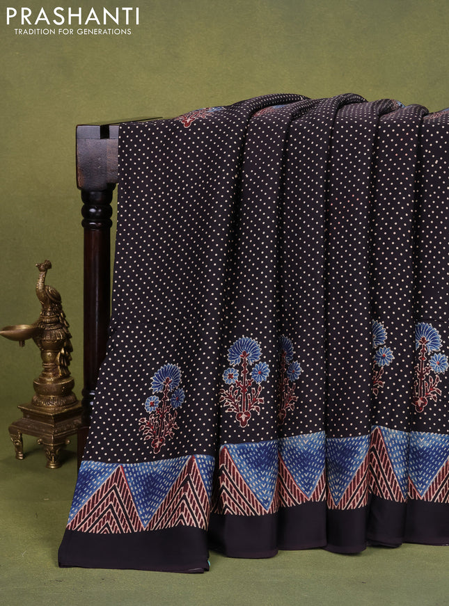 Modal silk saree black with allover ajrakh prints and printed pallu