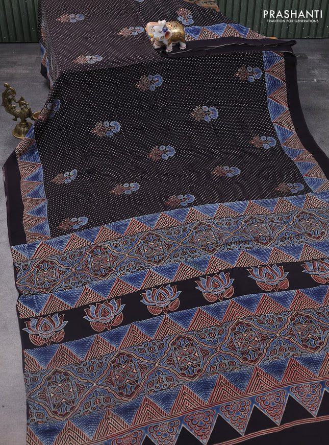 Modal silk saree black with allover ajrakh prints and printed pallu
