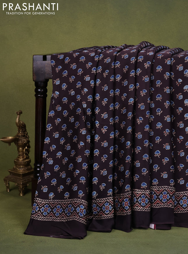 Modal silk saree black with allover ajrakh prints and printed pallu