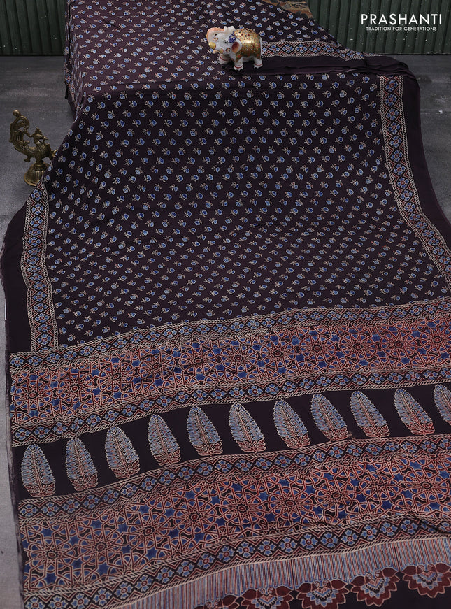 Modal silk saree black with allover ajrakh prints and printed pallu