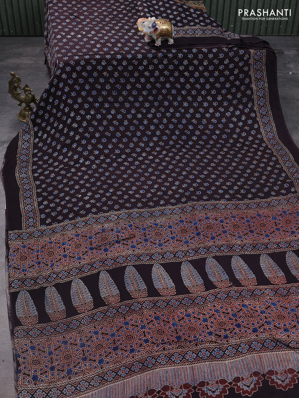 Modal silk saree black with allover ajrakh prints and printed pallu