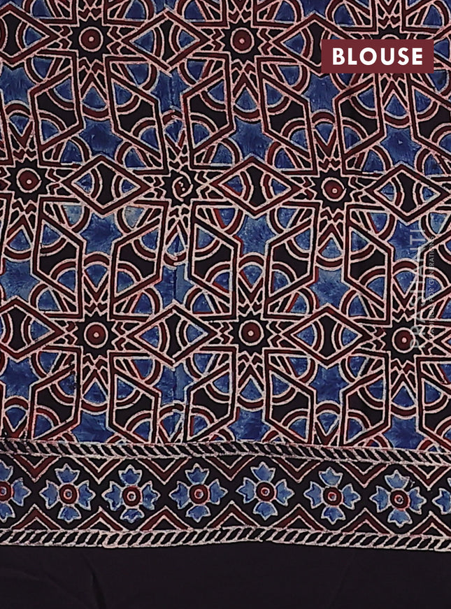 Modal silk saree black with allover ajrakh prints and printed pallu