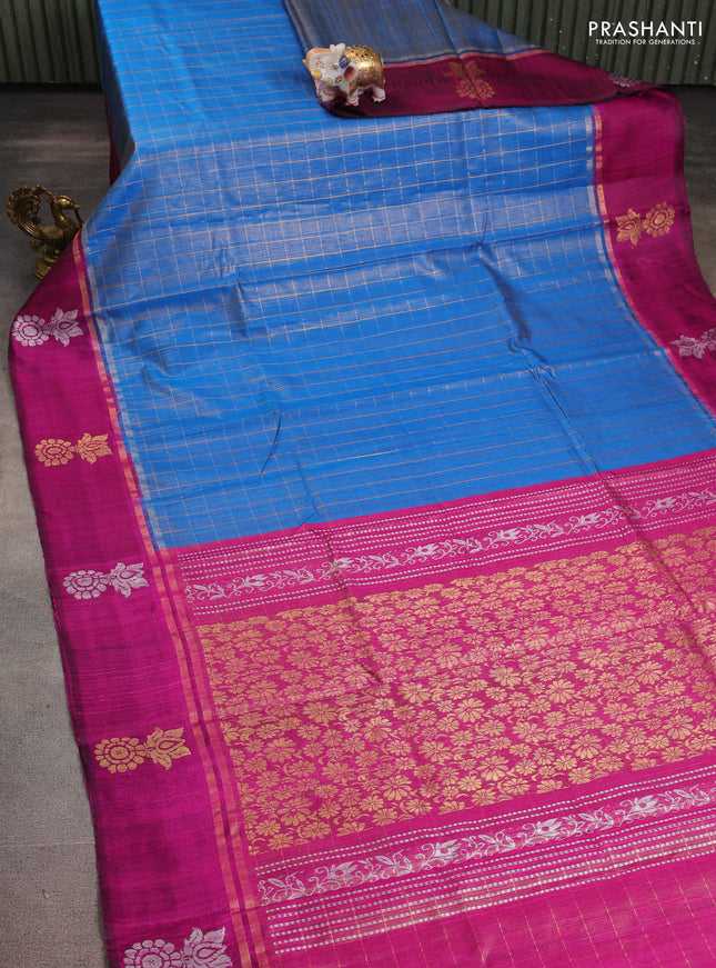 Pure dupion silk saree cs blue and pink with allover zari woven checked pattern and silver & zari woven butta border