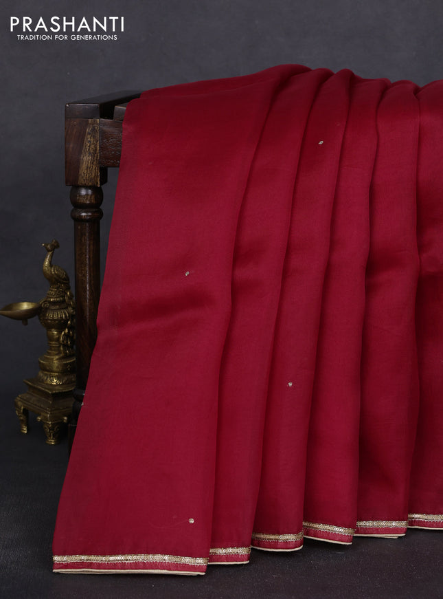 Pure organza silk saree maroon with embroidery zari buttas and sequin embroidered border