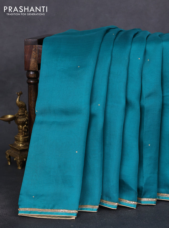Pure organza silk saree teal green with embroidery zari buttas and sequin embroidered border