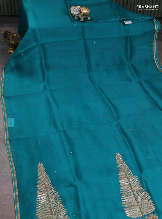 Pure organza silk saree teal green with embroidery zari buttas and sequin embroidered border