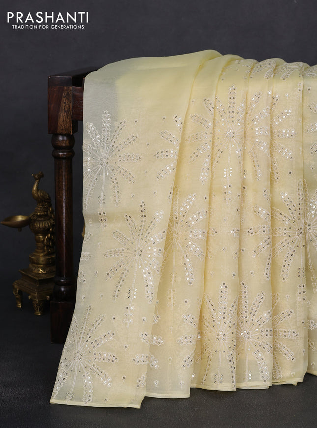 Pure organza silk saree pale yellow with allover sequin work in borderless style