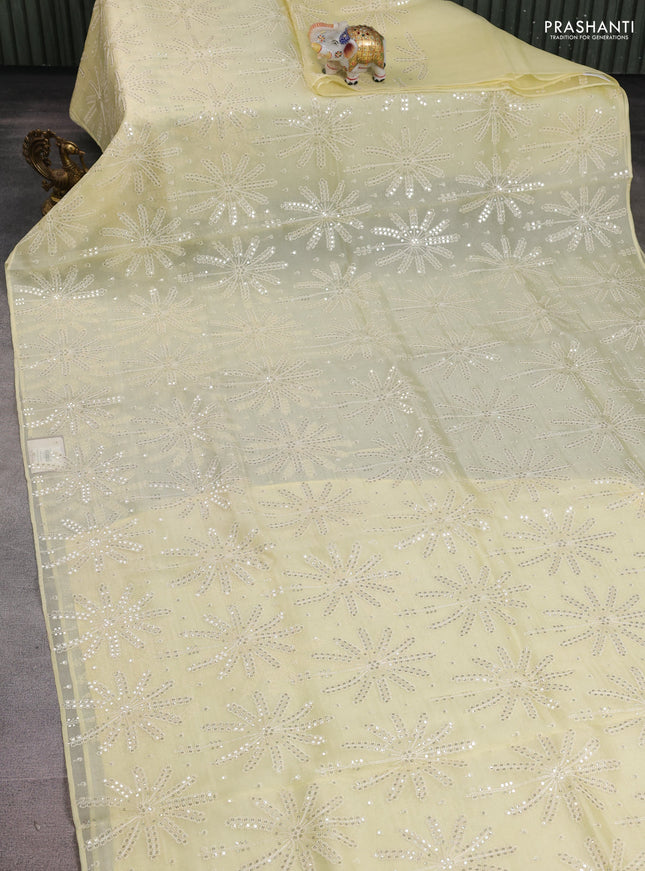 Pure organza silk saree pale yellow with allover sequin work in borderless style