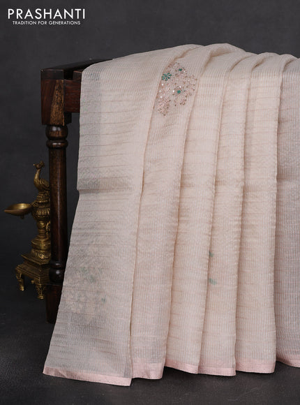 Pure organza silk saree off white with allover zari stripe pattern & zardosi work and zari woven piping border
