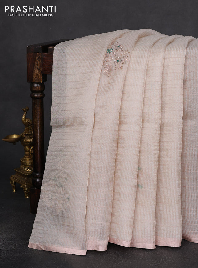 Pure organza silk saree off white with allover zari stripe pattern & zardosi work and zari woven piping border