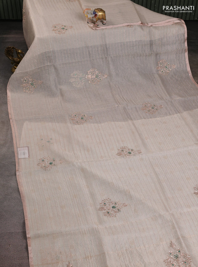 Pure organza silk saree off white with allover zari stripe pattern & zardosi work and zari woven piping border