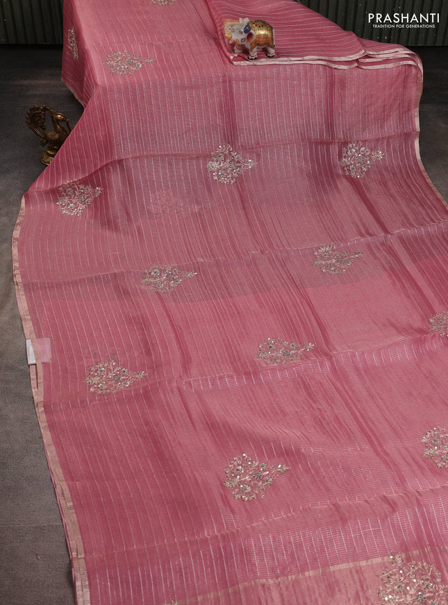 Pure organza silk saree light pink with allover zari stripe pattern & zardosi work and zari woven piping border