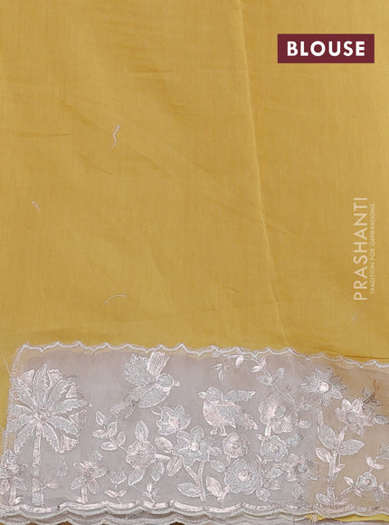 Pure organza silk saree yellow and cream with allover silver & gold stripes pattern and embroidery border