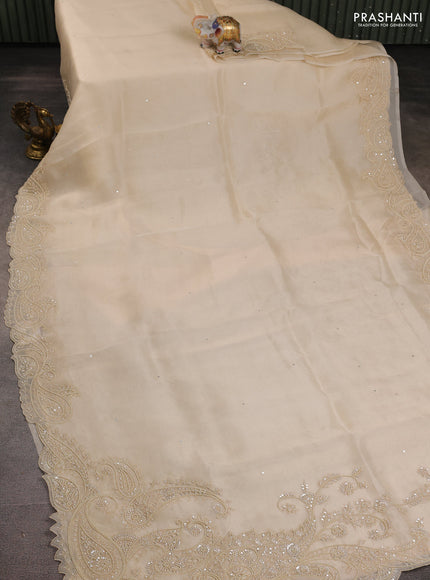Pure organza silk saree cream with mirror embroidery buttas and embroidered beaded border
