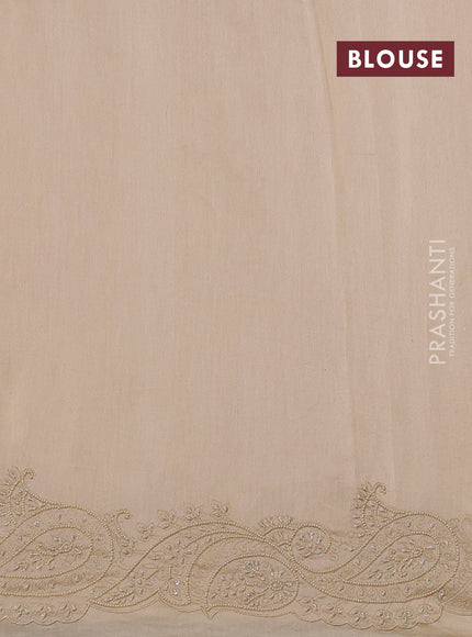 Pure organza silk saree cream with mirror embroidery buttas and embroidered beaded border
